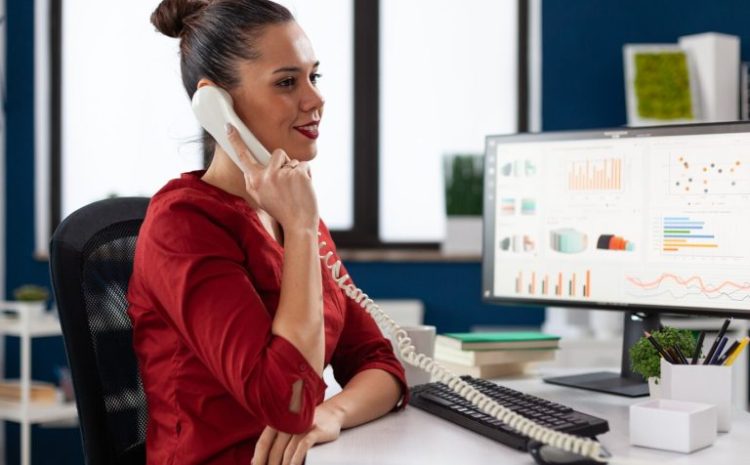 businesswoman-sitting-desk-corporate-office_482257-8052-768x512